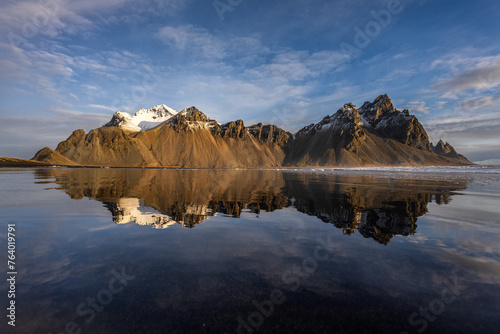 The reflection of VESTRAHORN, The great of mountain at Hofn, Iceland in the morning