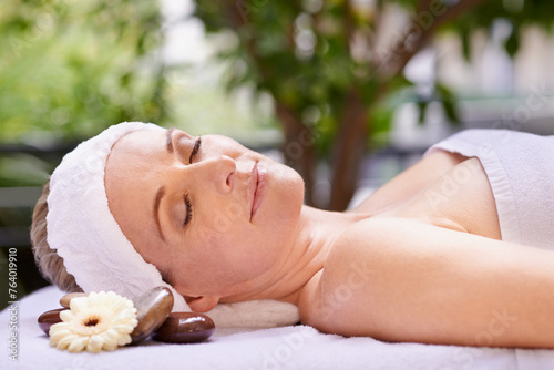 Happy woman  sleeping and relaxation with zen for skincare  stress relief or peace at spa  hotel or resort. Calm female person asleep in relax for facial  beauty or body treatment at outdoor salon