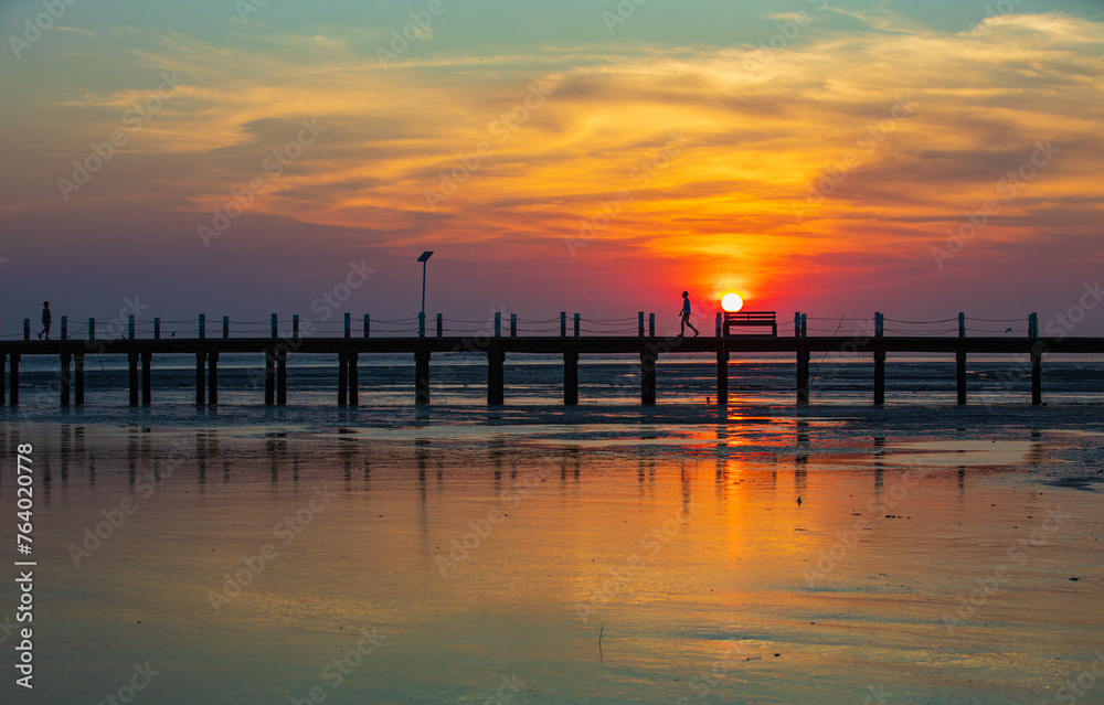 The nature of beautiful, bridge on the sea and suntset