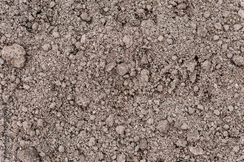Background, texture of dug up dry earth, Ukrainian black soil. Nature photography, agriculture concept.