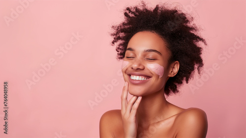 Close up beauty girl applying moisturizing skincare cream, lotion or mask for skin lifting and anti-aging detoxifying effect