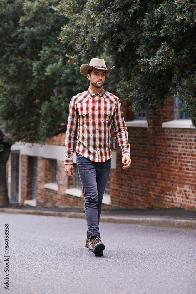Man, road and outdoor cowboy fashion, western culture and countryside ranch in Texas. Male person, hat and flannel shirt for farmer aesthetic, nature and plaid style by trees or outside street