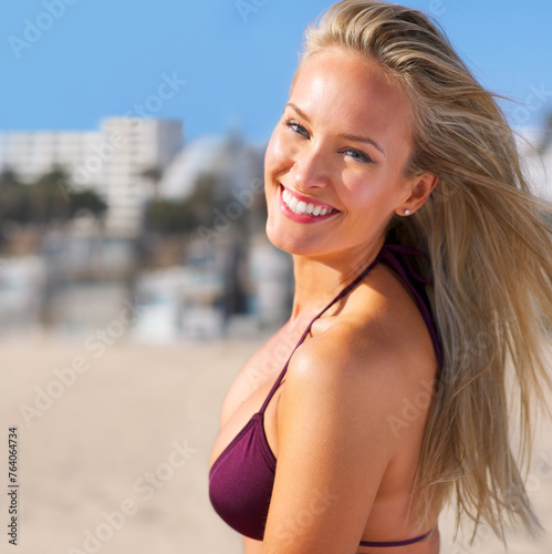 Beach, portrait and happy woman in swimsuit for travel, holiday and summer vacation in Maldives. Bikini, smile and face of female person for relax, outdoor adventure or tourist getaway at seashore
