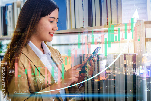 Double exposure of stock market graph and business woman working on smart phone at office. financial stock exchange marketing concept.	
