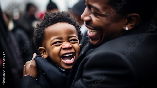 Affectionate hugs and radiant smiles African father and his little son, happiness concept, banner