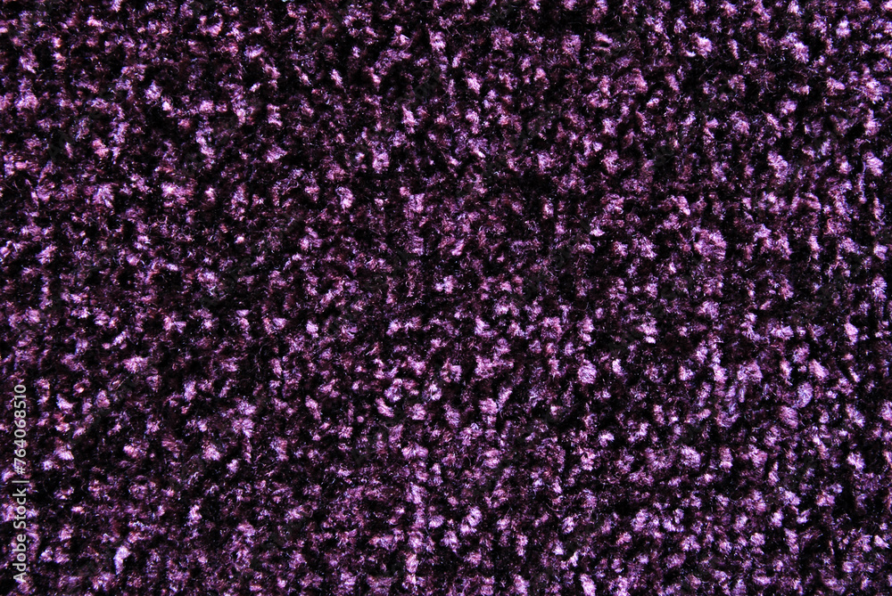 Purple fluffy velvet knit fabric pattern as background Purple fluffy velvet knit fabric pattern as background