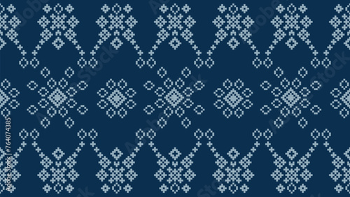 Traditional ethnic motifs ikat geometric fabric pattern cross stitch.Ikat embroidery Ethnic oriental Pixel navy blue background. Abstract,vector,illustration. Texture,scarf,decoration,wallpaper.