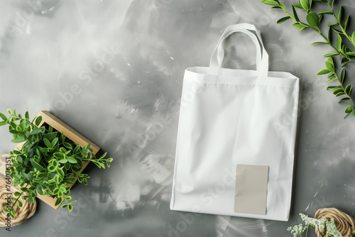 white bag mockup with no design on a grey marble background with natural elements (2)