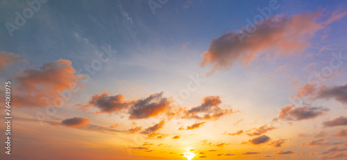 Morning clouds and sky,Panorama sunset sky and cloud background,Orange sky and clouds background,Background of colorful sky concept, amazing sunset with twilight sky and clouds © banjongseal324