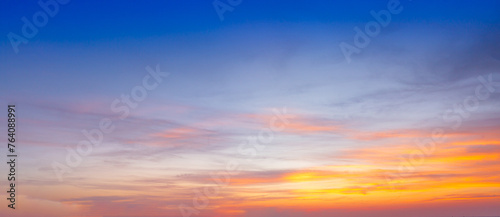 Fototapeta Naklejka Na Ścianę i Meble -  Morning clouds and sky,Panorama sunset sky and cloud background,Orange sky and clouds background,Background of colorful sky concept, amazing sunset with twilight sky and clouds