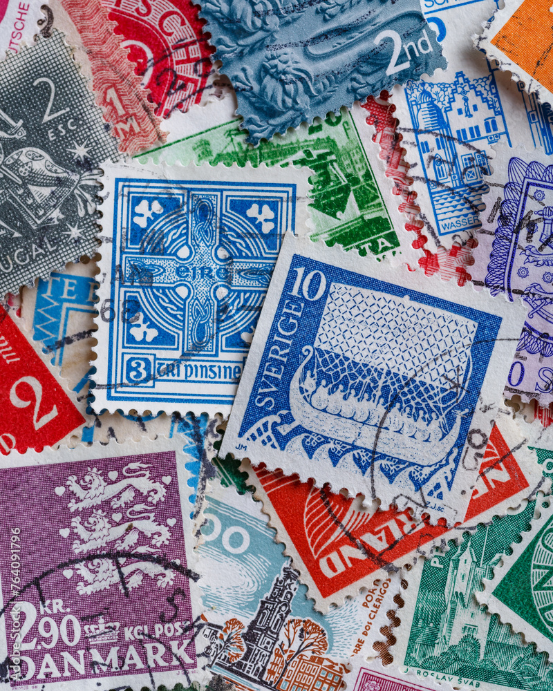 Ukraine, Kiyiv - January 12, 2023 Ireland Postage stamps..Postage stamps.A collection of world stamps in a pile.Postage stamps from different countries and times