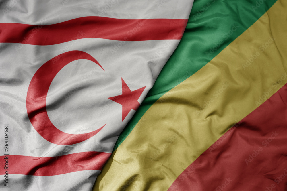 big waving national colorful flag of republic of the congo and national flag of northern cyprus. big waving national colorful flag of republic of the congo and national flag of northern cyprus.