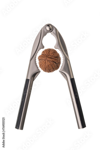 Metal nut cracker tongs for opening nuts isolated on white background. with a walnut inside. Close-up.