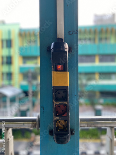 Electric plugs on bus stop poles