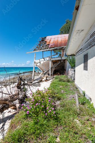 Hurricane-destroyed old building on the beach of Remire Island, Seychelles.