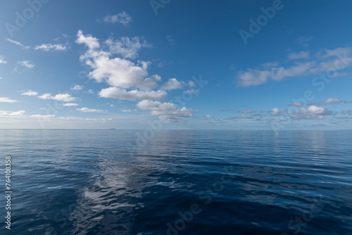 Tranquil nature background with calm sea and blue sky. Indian Ocean, Seychelles. photo