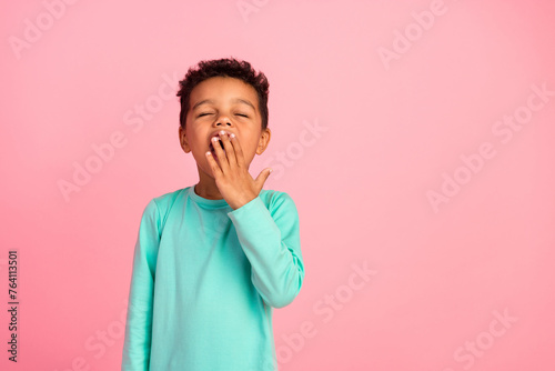 Slika na platnu Photo portrait of cute little boy sleepy yawn cover mouth wear trendy aquamarine