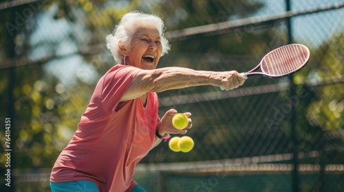 Joyful senior woman actively playing pickleball, showcasing health and vitality with a beaming smile during a sunny day at the court - AI generated © qntn