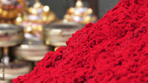 Kumkum, a traditional Indian women cosmetic powder in closeup