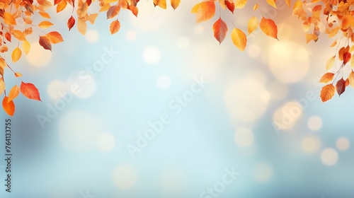 Beautiful autumn foliage background with brunches and falling tree leaves at sky with bokeh photo