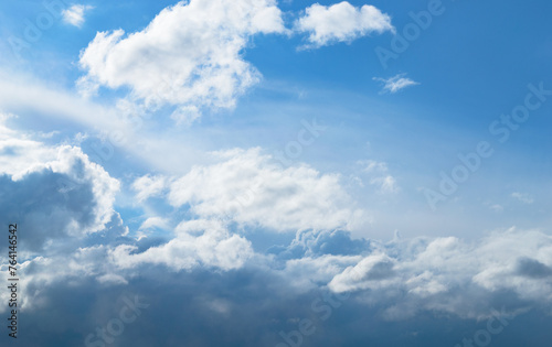 Sky blue landscape with beautiful cumulus clouds © Maksim