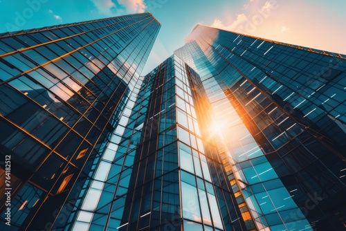 Modern and luxury skyscrapers in megapolis city sunset light during sunny day