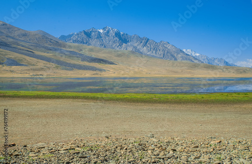 Huge mountains on green land in Ghizer valley Pakistan photo