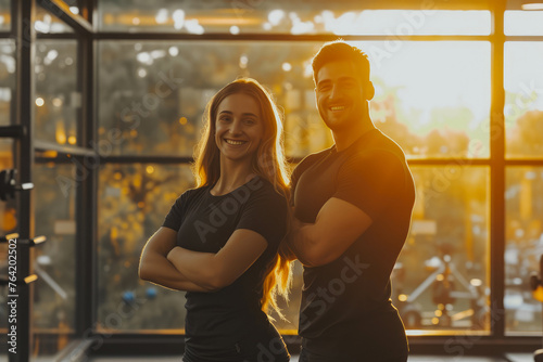 Gym Happiness  Personal Trainers Beaming in Sunset Light