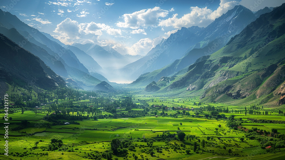 A breathtaking vista of lush green meadows nestled amidst majestic mountain peaks. 