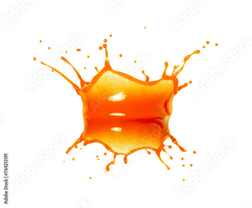 Splashes of fruit or vegetable juice in the air isolated on a white background