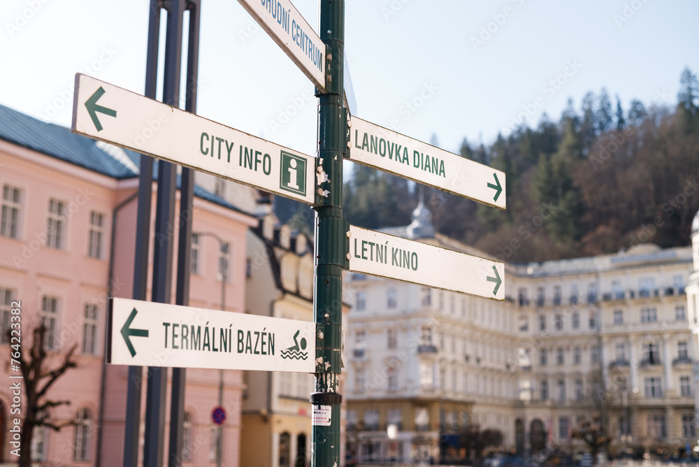 Directional signs to attractions in Karlovy Vary, Czech Republic, February 2024