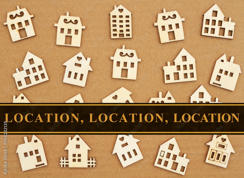 Location Location Location message with wood houses