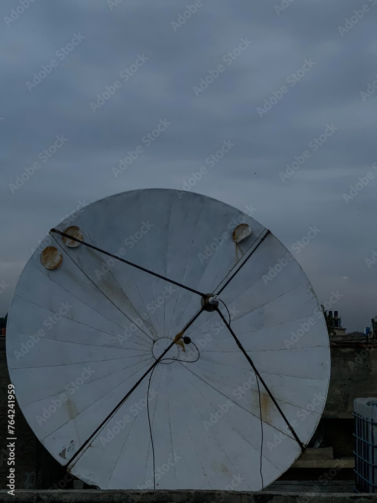 a satellite dish with a satellite dish on top of it.