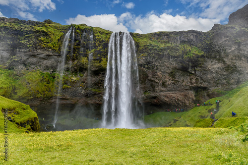 The magnificent Seljalandsfoss waterfall in Iceland. Location  Seljalandsfoss waterfall  part of the Seljalandsa river  Iceland  Europe