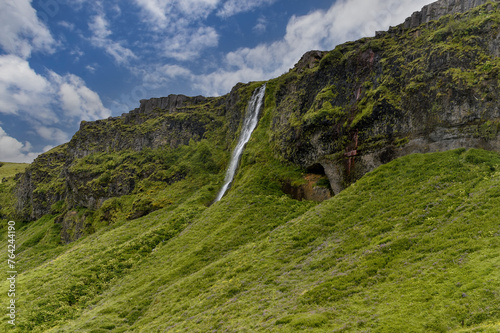 The magnificent Seljalandsfoss waterfall in Iceland. Location: Seljalandsfoss waterfall, part of the Seljalandsa river, Iceland, Europe photo