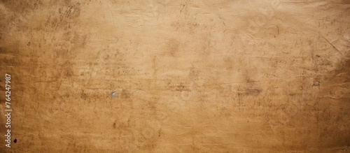 Brown wall with small hole and old cardboard texture