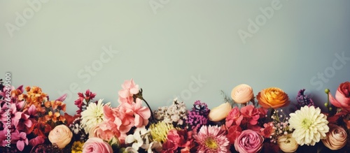 Beautiful flowers arranged in a row on a table