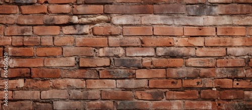 A brick wall featuring the texture of bricks