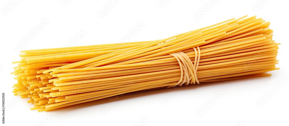 Spaghetti noodles on white surface Spaghetti noodles on white surface