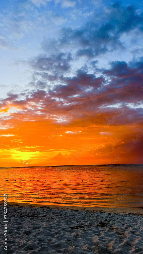 Gorgeous sunset over serene beach breathtaking summer landscape on Maldives