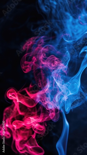 Neon blue and pink smoke on a dark background