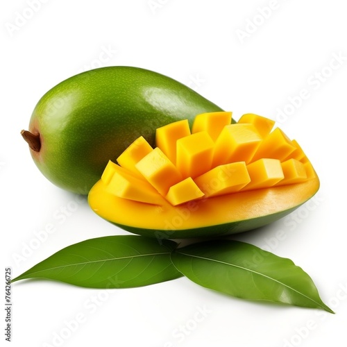 Ripe yellow Mango with cut in half and green leaf isolated on white background.