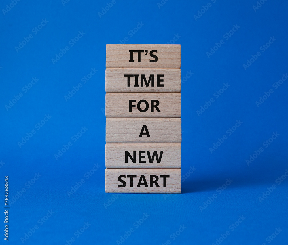 Time for a new start symbol. Wooden blocks with words Time for a new start. Beautiful blue background. Business and Time for a new start concept. Copy space. Time for a new start symbol. Wooden blocks with words Time for a new start. Beautiful blue background. Business and Time for a new start concept. Copy space.