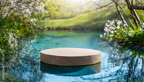  Circular platform, round podium for product display in pond with calm and clear blue water © Marko