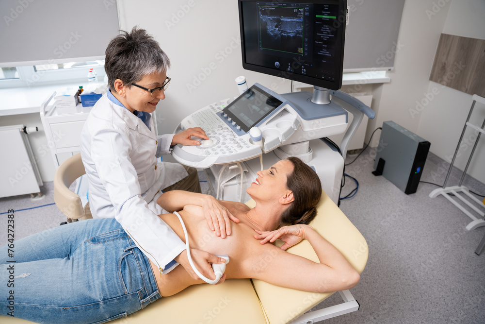 Patient Undergoing Diagnostic Examination in Clinic. Patient Undergoing Diagnostic Examination in Clinic.