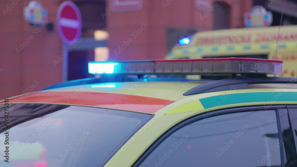 Ambulance vehicle with red and blue flashing lights on top. Emergency ...