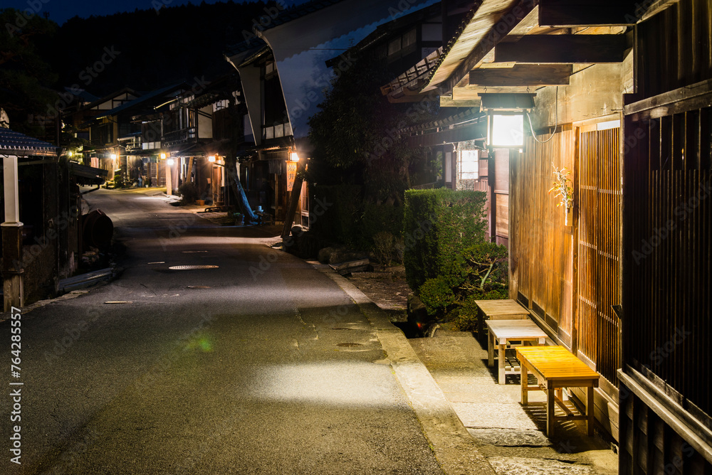 Tsumago, Japan - March 21 2016: Tsumago town night pictures and japanese traditional village houses with sign board Tsumago, Japan - March 21 2016: Tsumago town night pictures and japanese traditional village houses with sign board