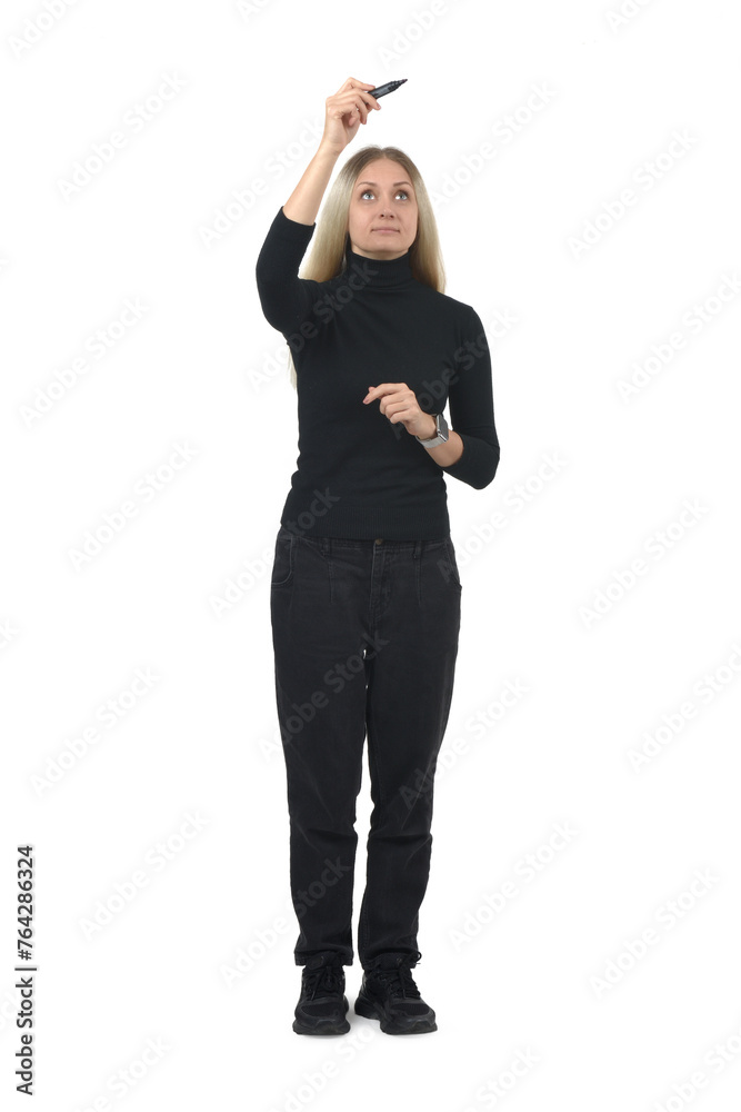 front view of a woman drawing or writing imaginatively upwards on white background. front view of a woman drawing or writing imaginatively upwards on white background.