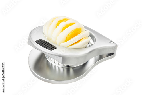 half open metal design egg slicer with sliced egg isolated on white background