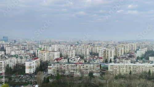 Drone flies left to right along Petko Todorov boulevard facing Triadinitsa district in Bulgarian capital Sofia in early Spring. photo